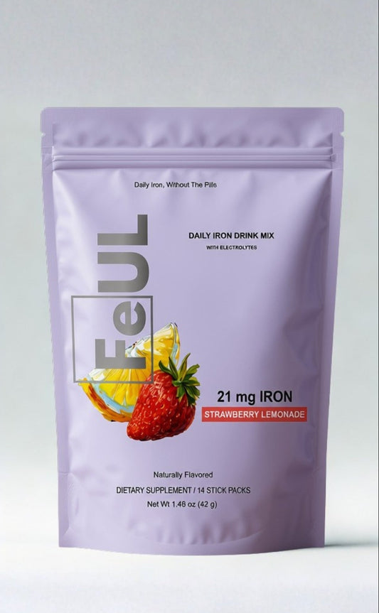 A stand-up pouch of FeUL Strawberry Lemonade daily iron drink mix, featuring a light purple packaging with illustrations of a strawberry, orange slice, and lemon on a neutral gray background.